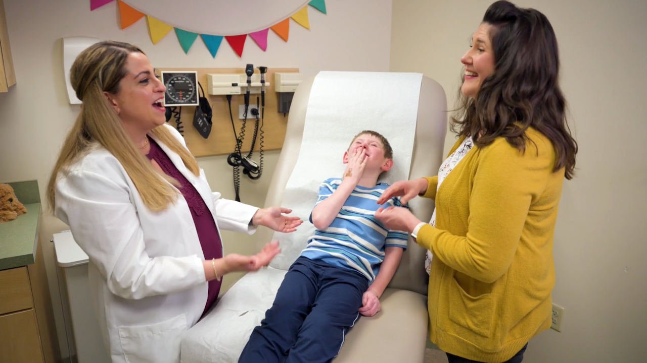 Video thumbnail featuring Dr. Sivan Kinberg, her patient Caleb, and his caregiver discussing collaborative care with RELiZORB