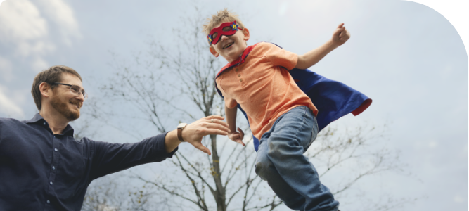 Photo of Caleb, who uses RELiZORB, playing with his father, Jimmy